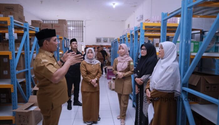 Bupati Aceh Besar “Syech Muharram” Ajak Nakes Layani Masyarakat dengan Ikhlas